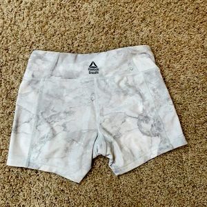 Reebok CF 4” athletic shorts